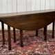 Drop-leaf English table in mahogany called Gateleg.