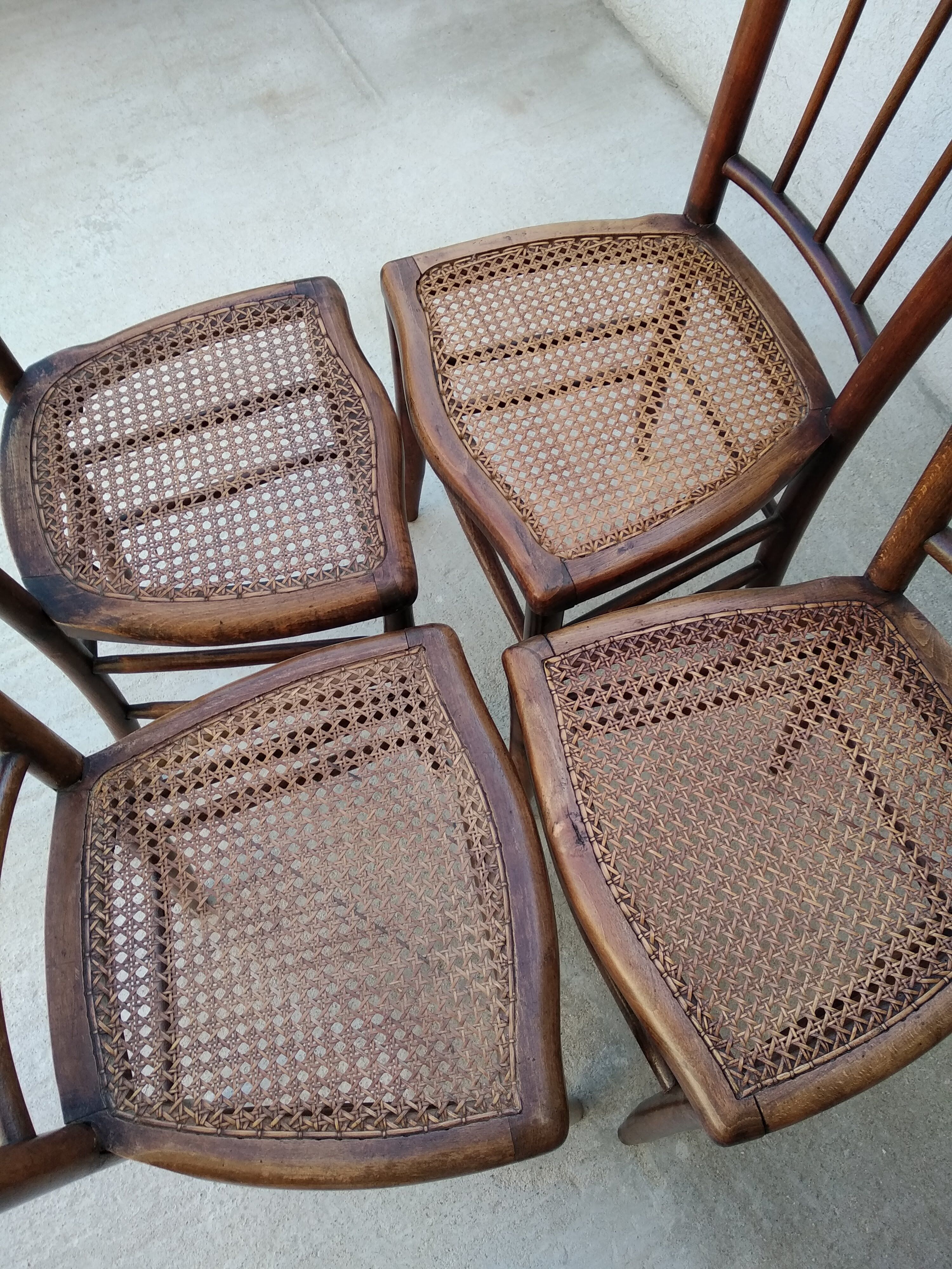 Set of 4 antique bistro chairs canned seats