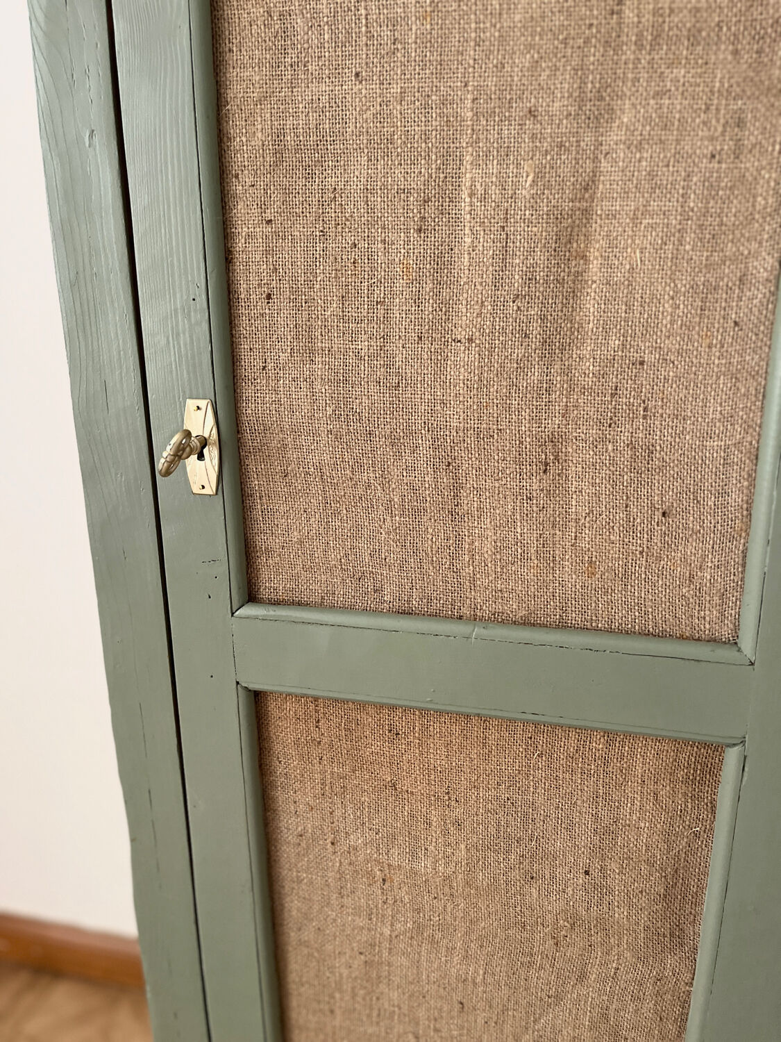 Small green cupboard celadon and jute