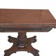 Table de jeu en livre ancien en acajou.
