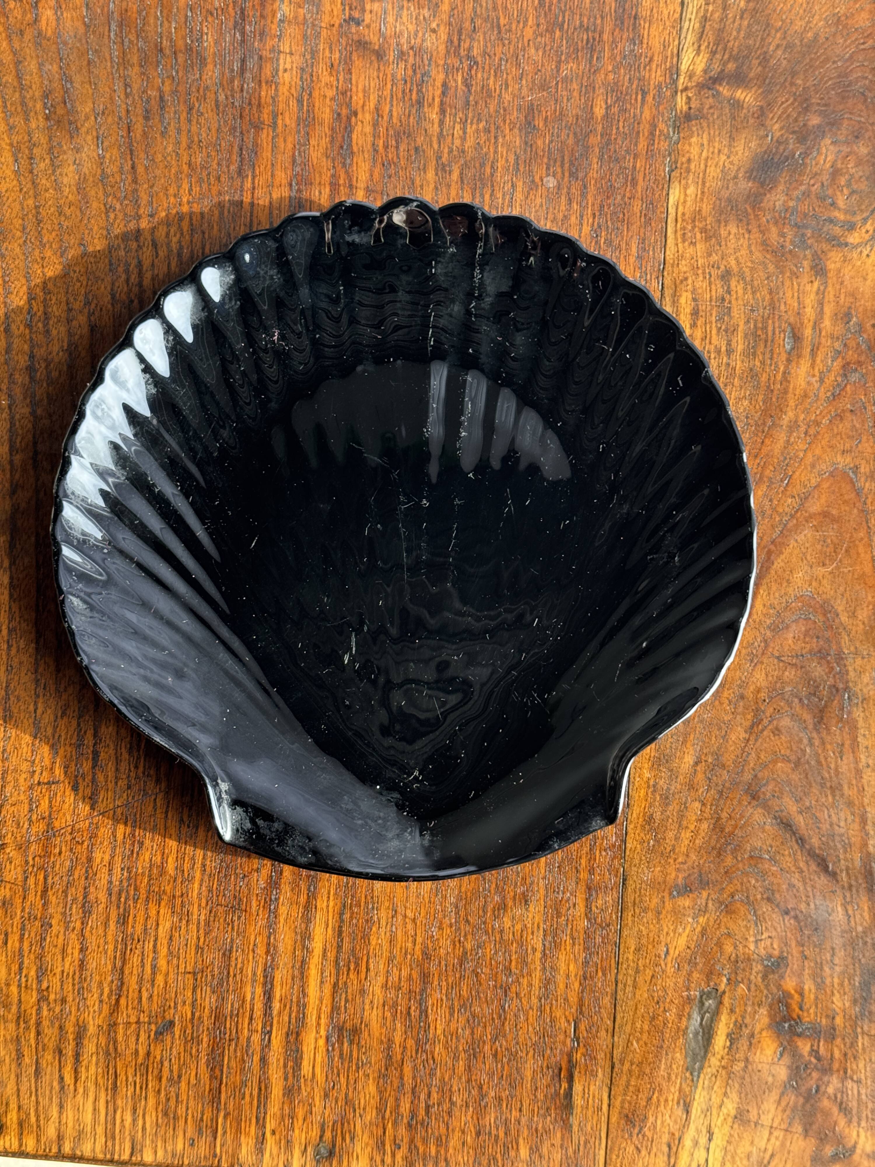 Pair of vintage black glass shell dishes D32 and D26