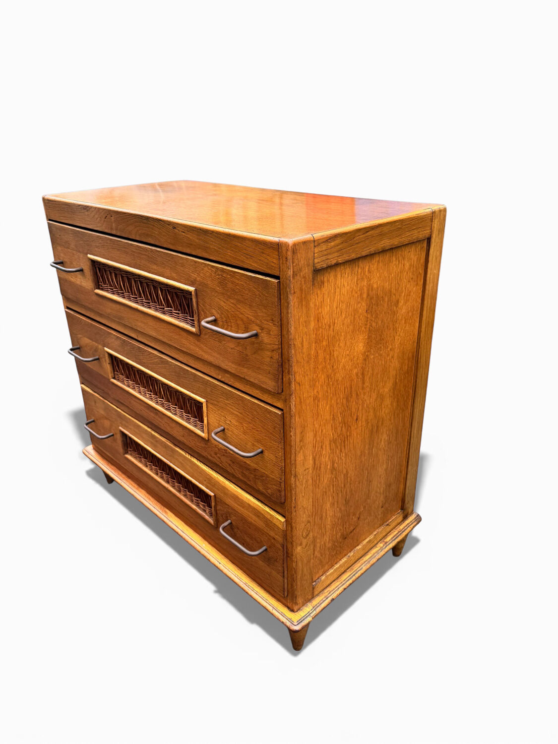 Vintage 1970s chest of drawers: wood and rattan, splayed legs.