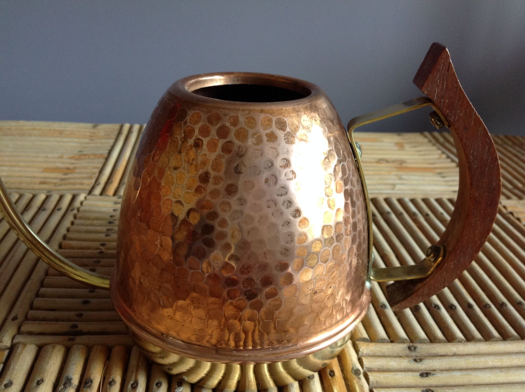 Copper and brass watering can