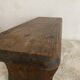 Old low stool made of solid wood