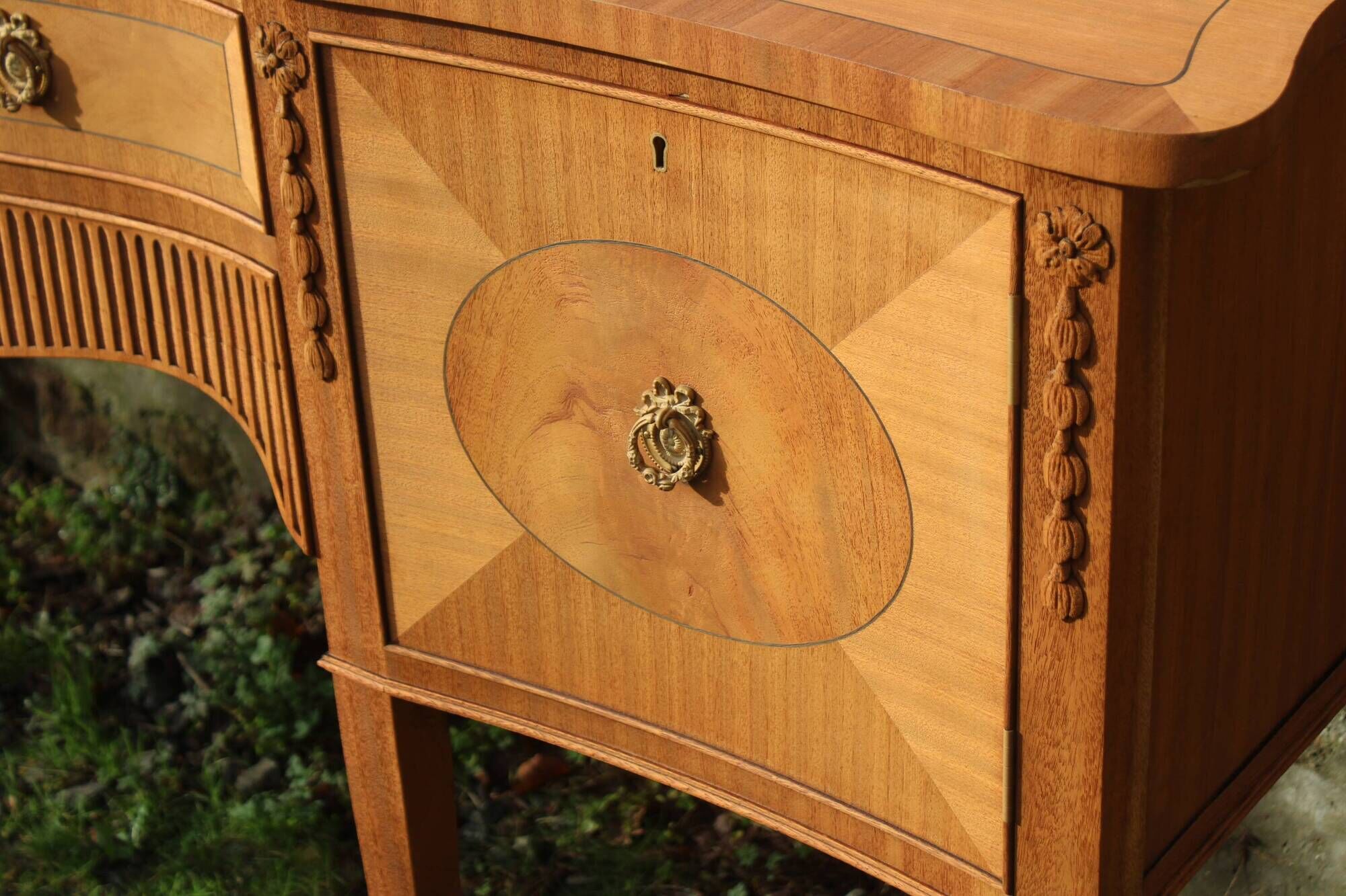 English-made enfilade in Louis XVI style with light wood veneers.
