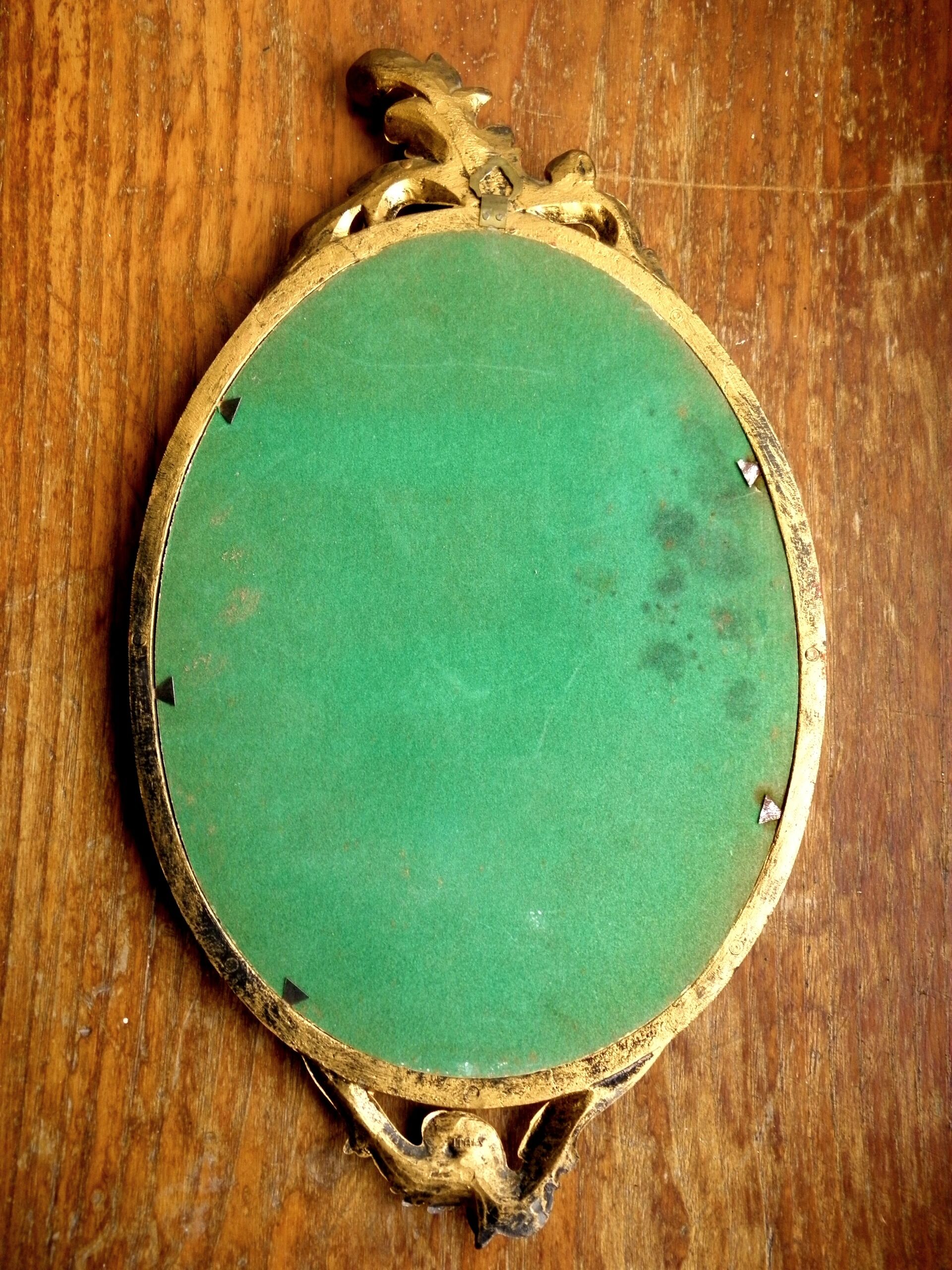 Miroir italien ovale en bois doré - 45x25cm