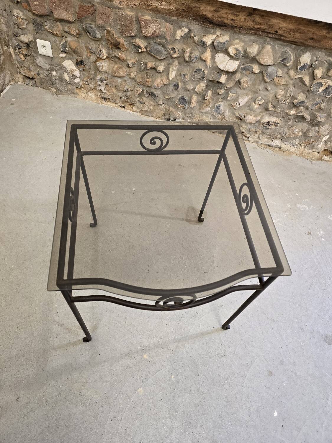 Small side table in wrought iron and smoked glass