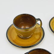 Set of four vintage Boch Palma cups and saucers.