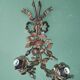 Pair of bronze and gilded metal wall sconces in the Louis XVI style.