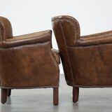 Set of 2 nice, subtle cowhide armchairs with reversible Kelim seat cushions