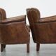 Set of 2 nice, subtle cowhide armchairs with reversible Kelim seat cushions