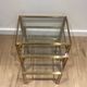 Set of 3 nesting tables in brass and glass. French work by Guy Lef.