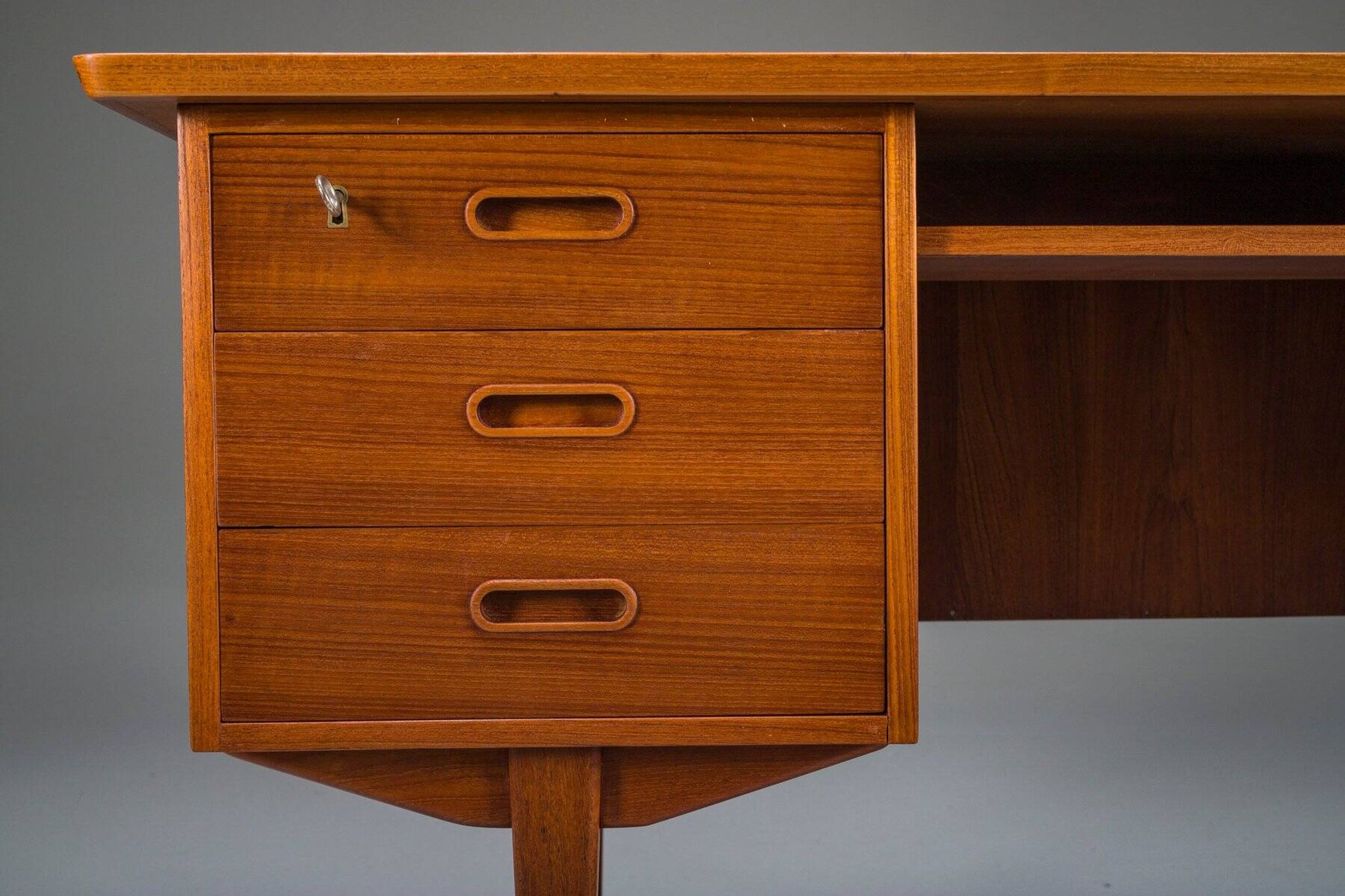 Mid-century Danish freestanding teak desk with raised lip edge, 1960s