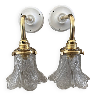 Pair of patterned tulip wall lights