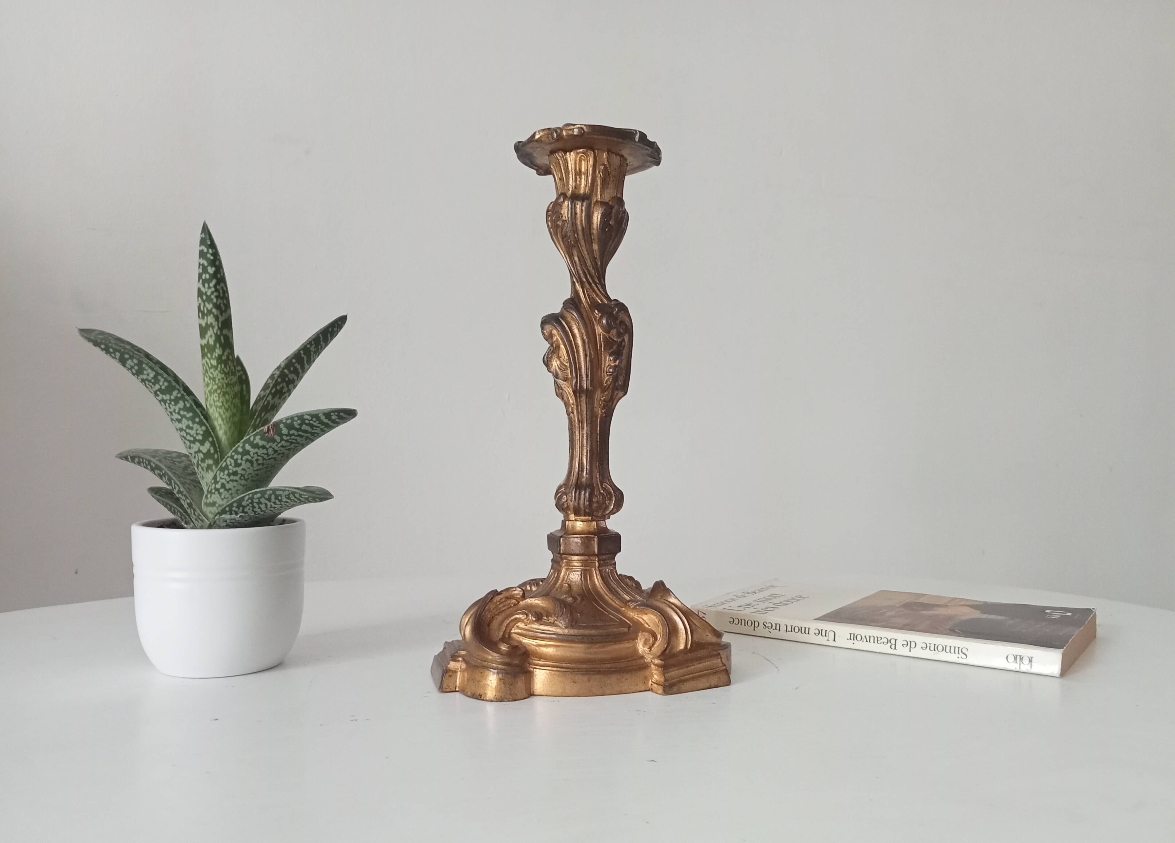 Antique 19th-century solid gilded bronze candlestick in the Louis XV style.