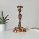 Antique 19th-century solid gilded bronze candlestick in the Louis XV style.