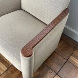 Pair of armchairs in carved wood and vintage fabric