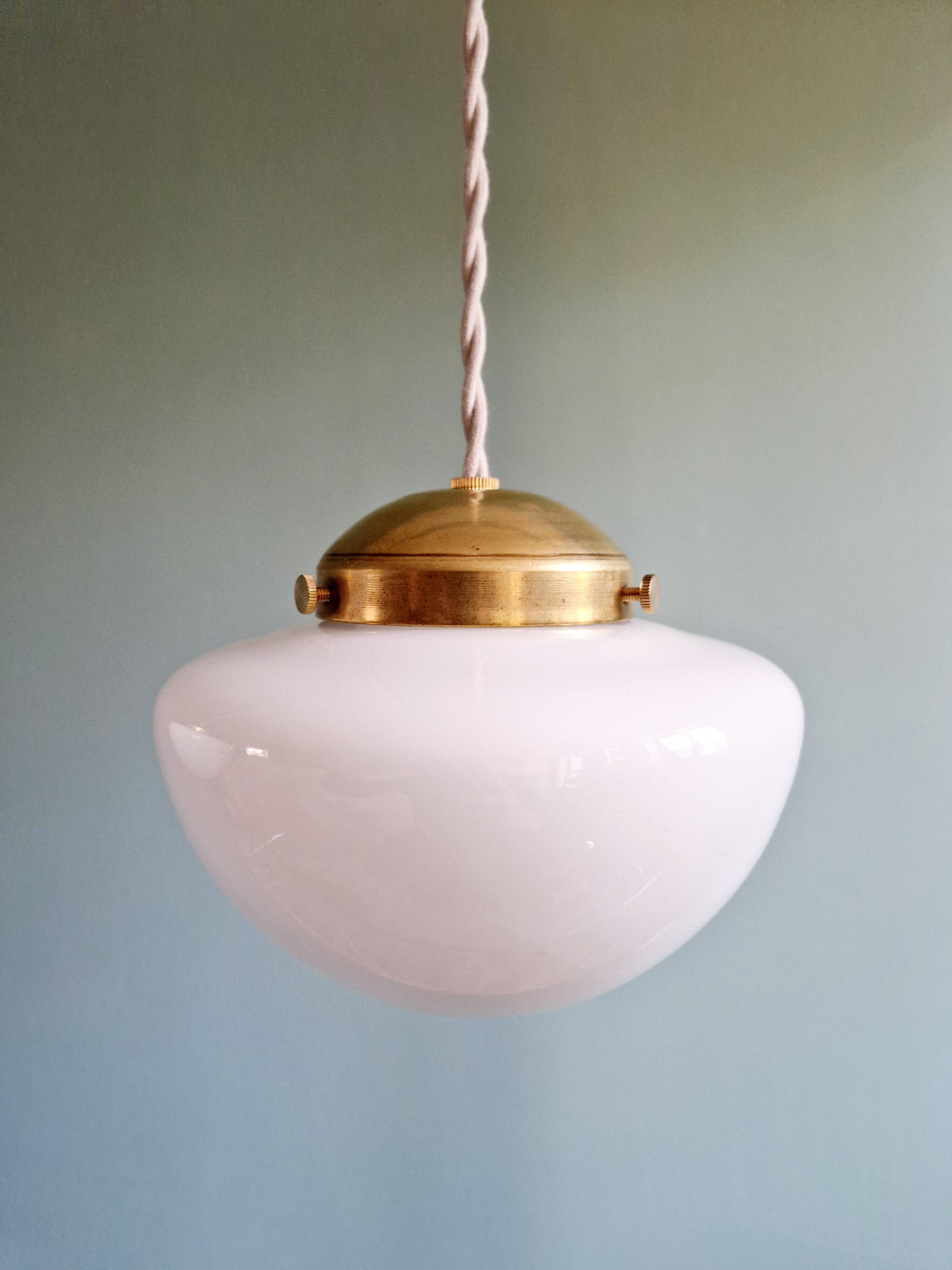 Duo of Art Deco suspensions in white opaline, 1920s-30s