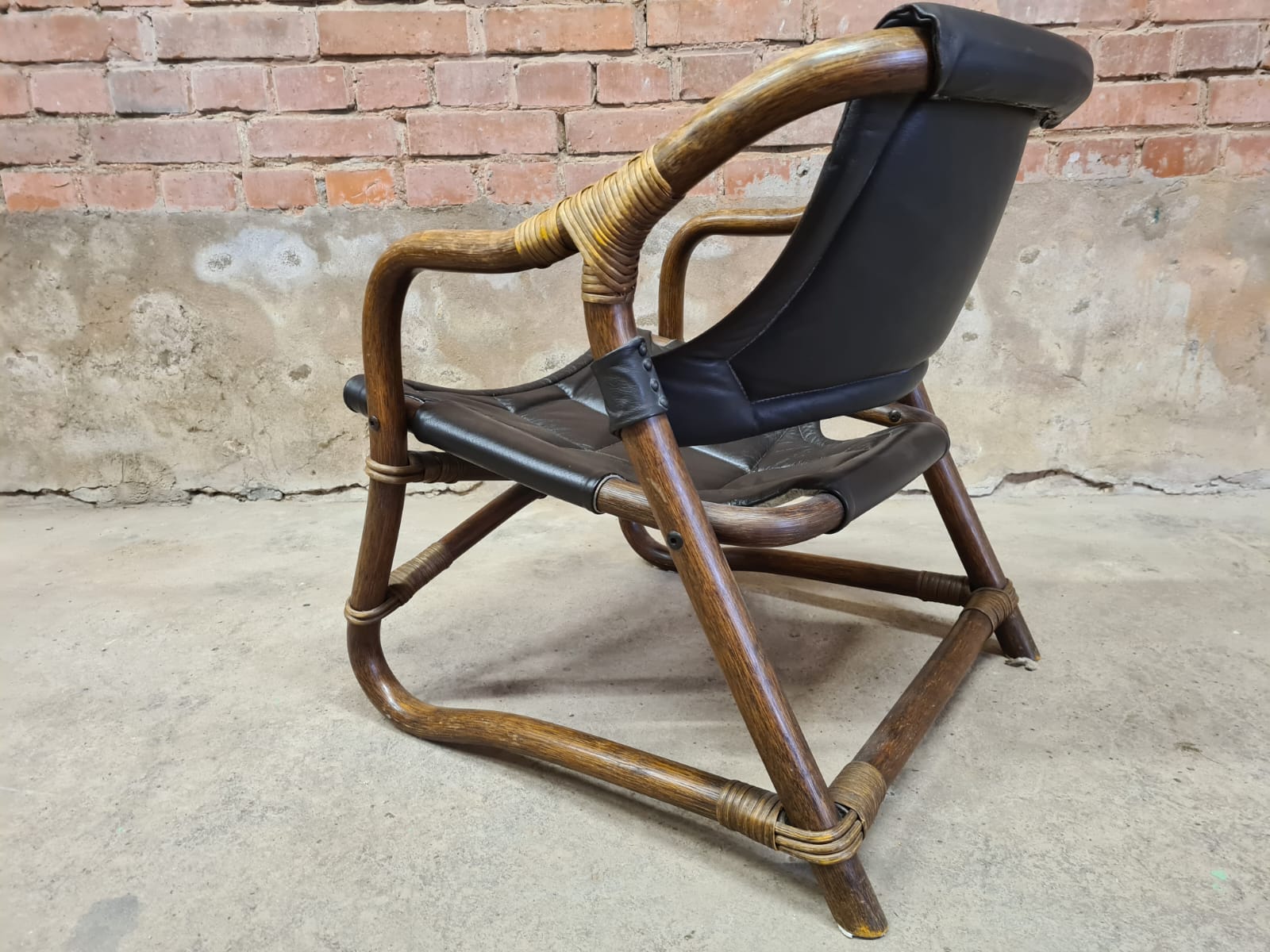Pair of vintage skaï bamboo armchairs
