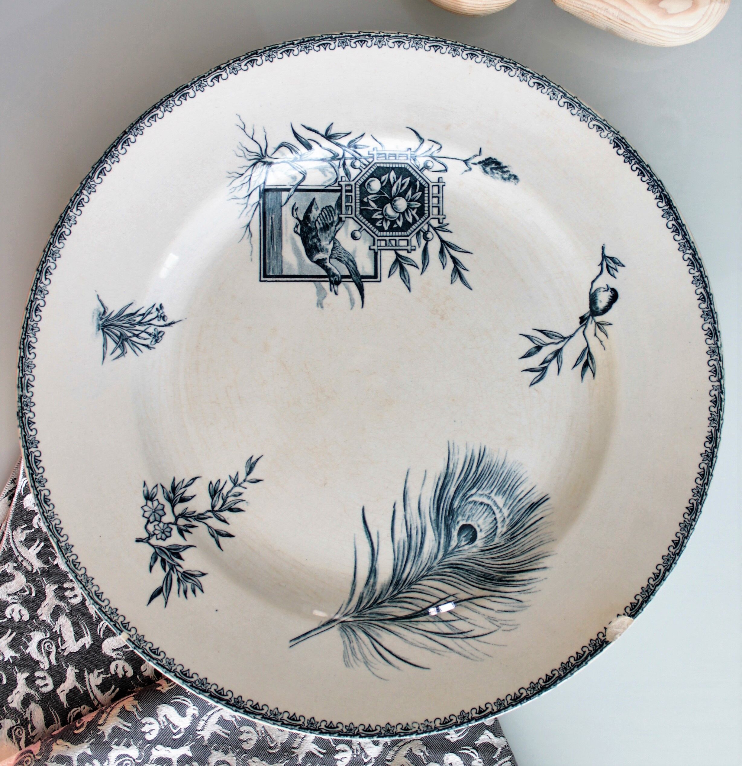 Old dish of opaque porcelain on ground transfer service