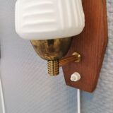 Danish wall lights from the 1970s, made of milky white glass shades, teak wood suspension and brass.