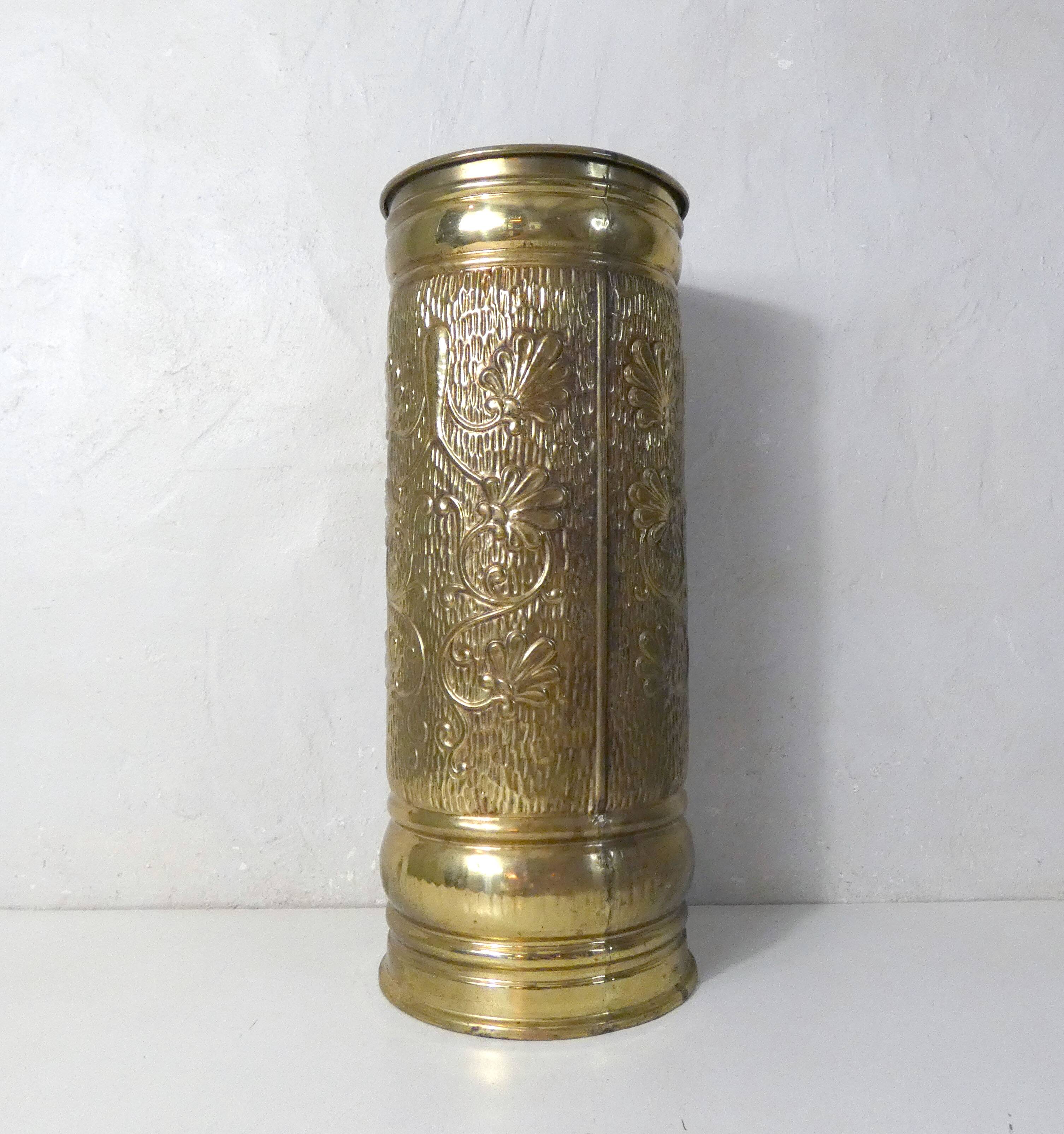 Old brass umbrella stand
