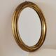 Miroir ovale cadre en bois doré 22 X 17 X 2 cm.