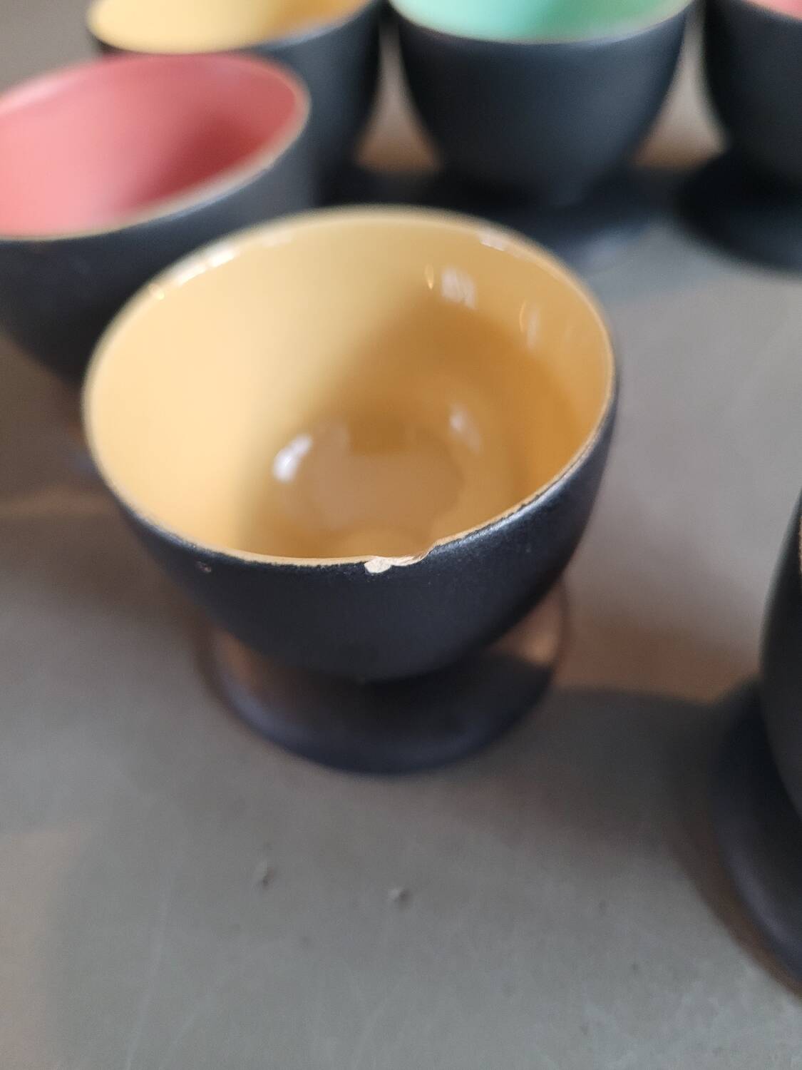 Set of 6 black and colored ceramic egg cups