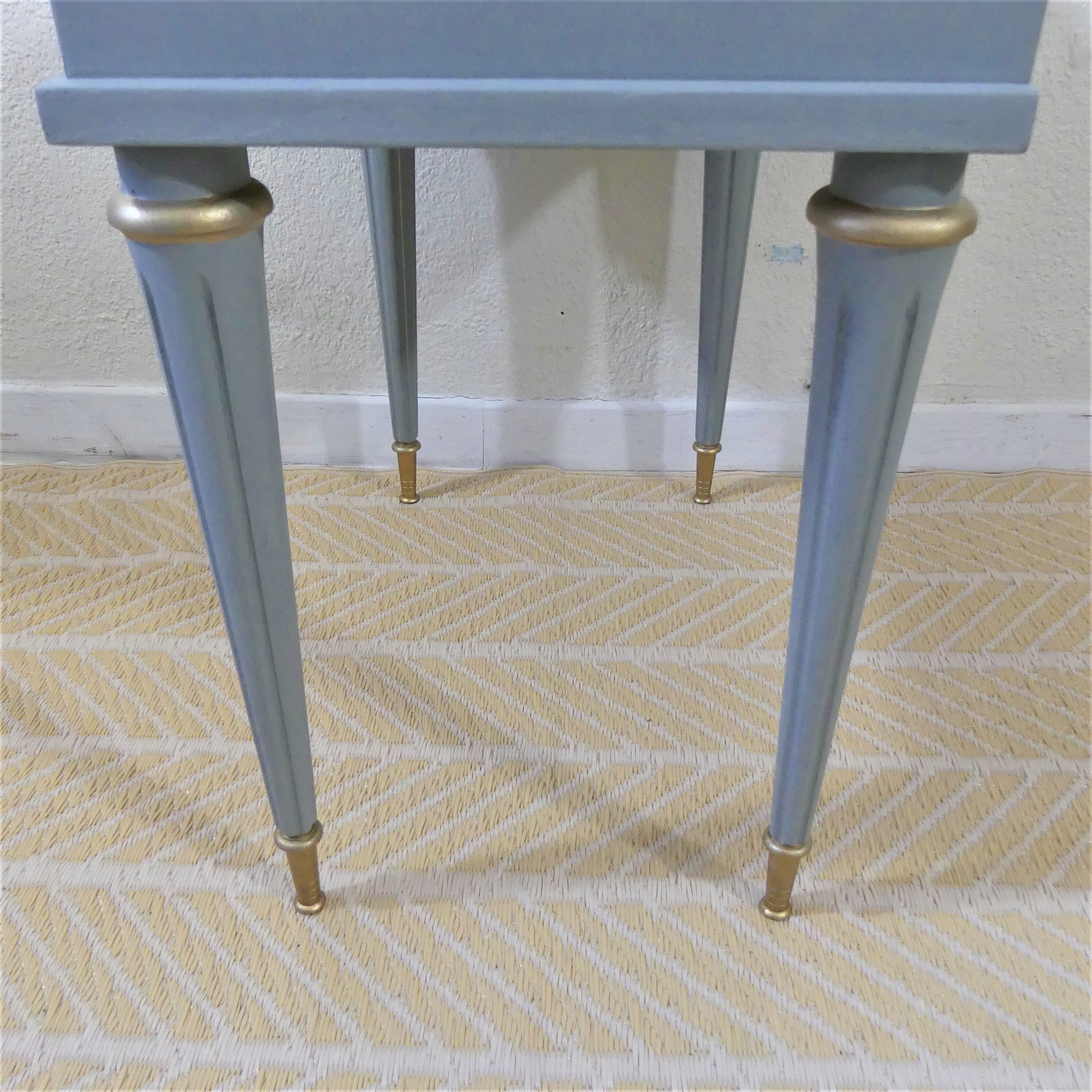 Bedside table with fluted spindle legs