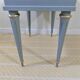 Bedside table with fluted spindle legs
