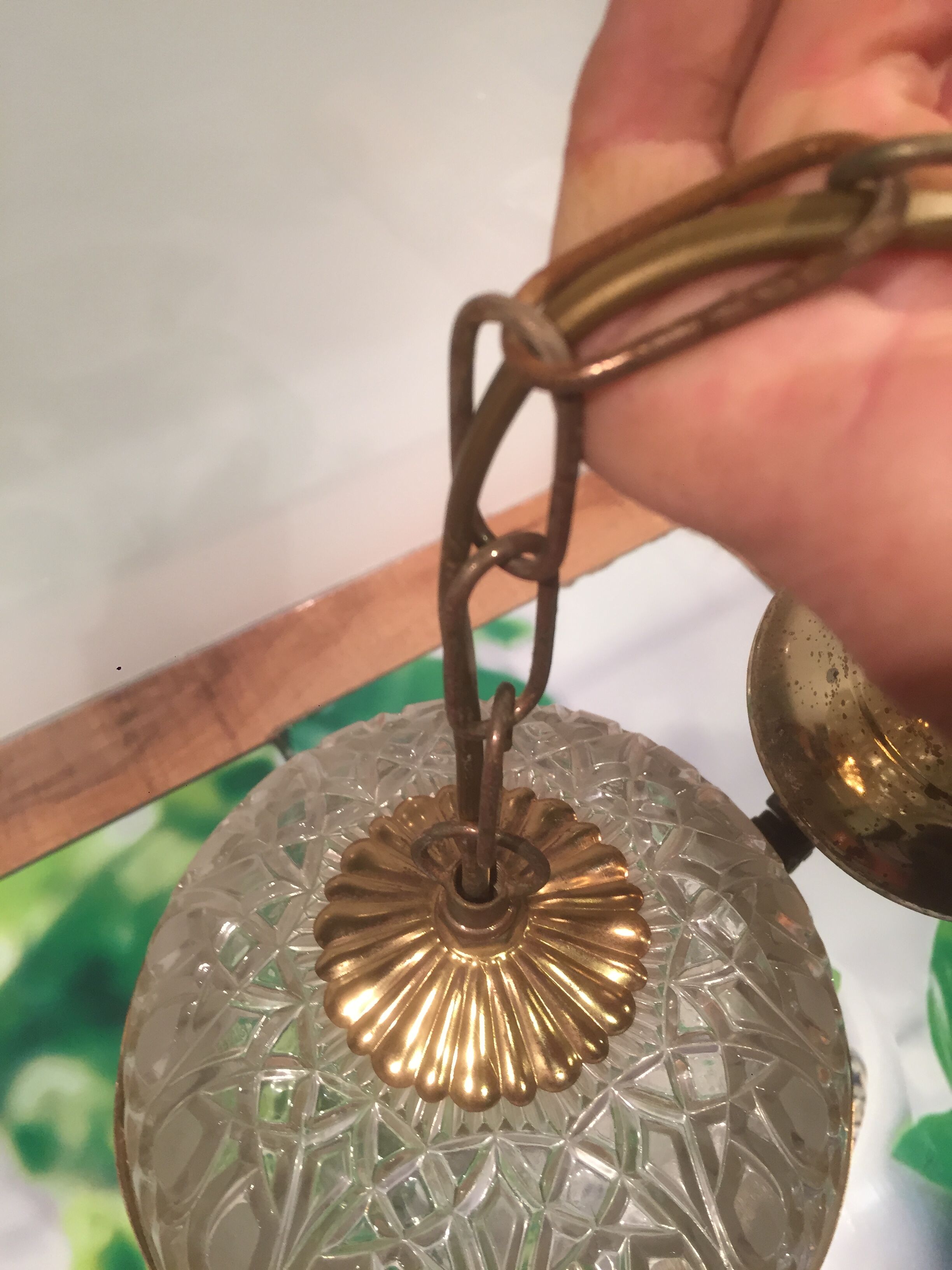 Hanging glass and stamps