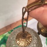 Hanging glass and stamps