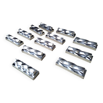 12 Silver-colored metal knife holders