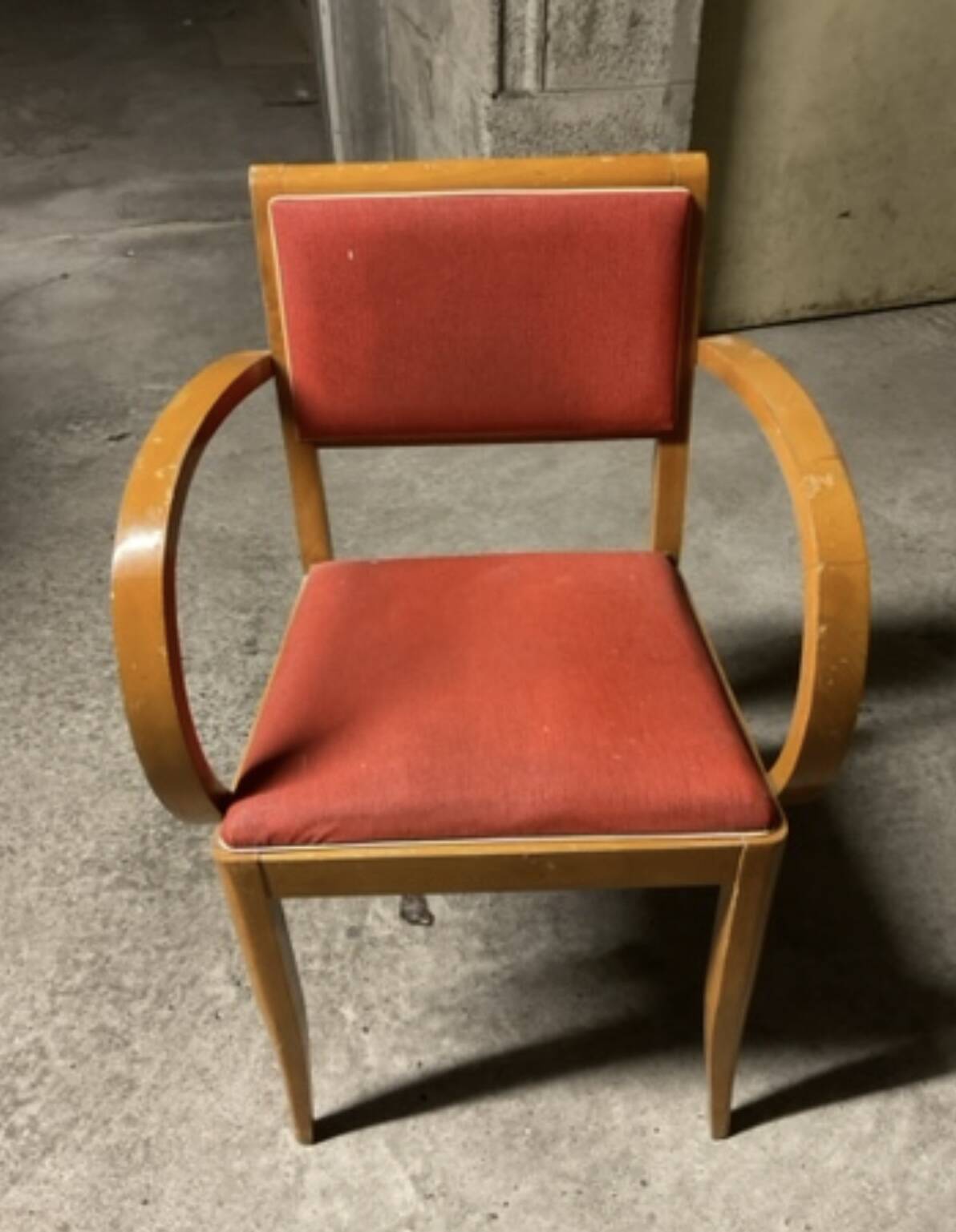 Club armchair with curved armrests known as "bridges" from the 1950s.