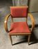 Club armchair with curved armrests known as "bridges" from the 1950s.