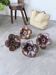 Four wooden flower wall lights from the 1970s.