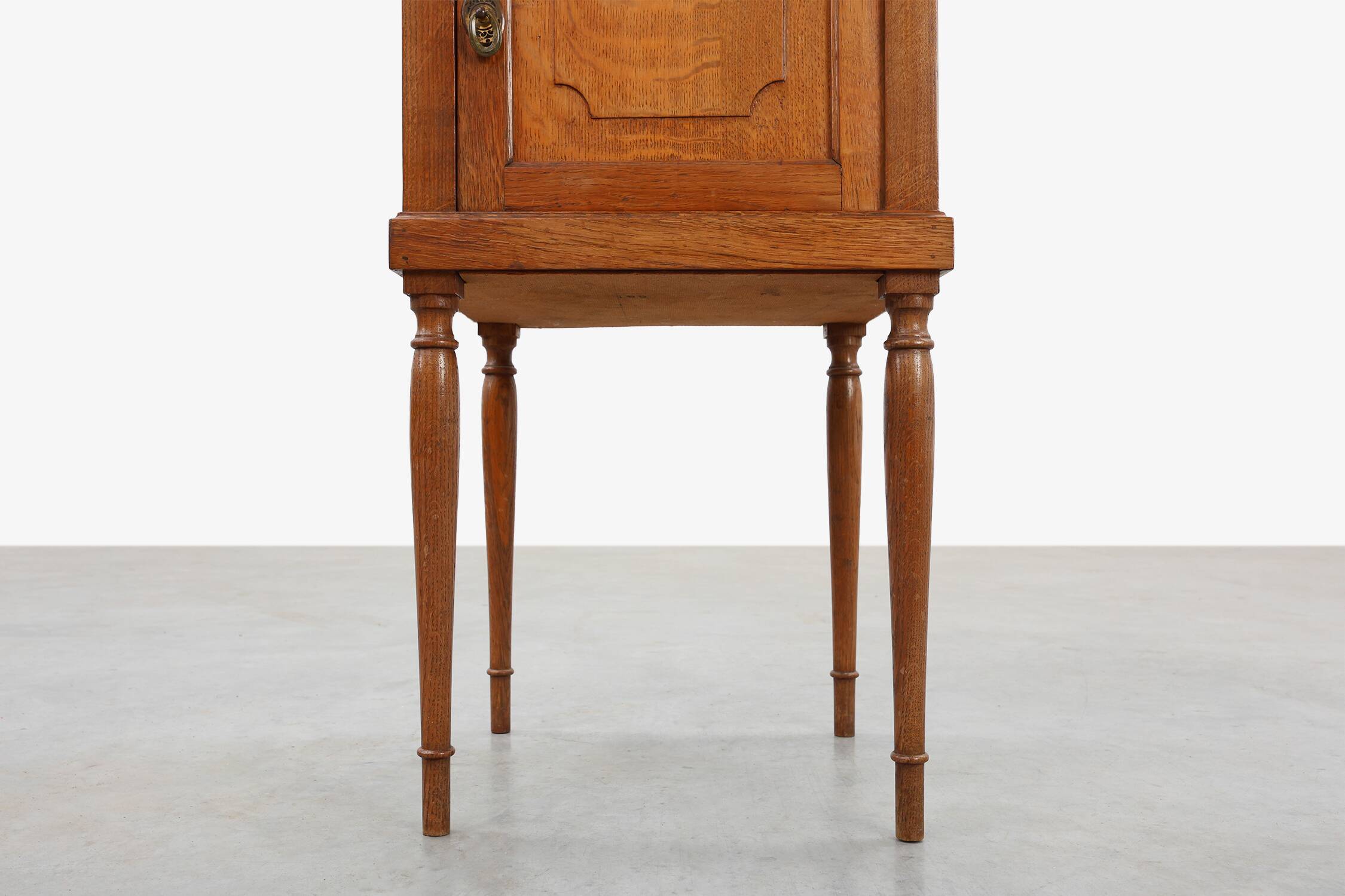 Art Deco nightstand in oak with turned legs, France 1920
