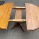 Round table in solid pine with a central baluster leg from 1980.