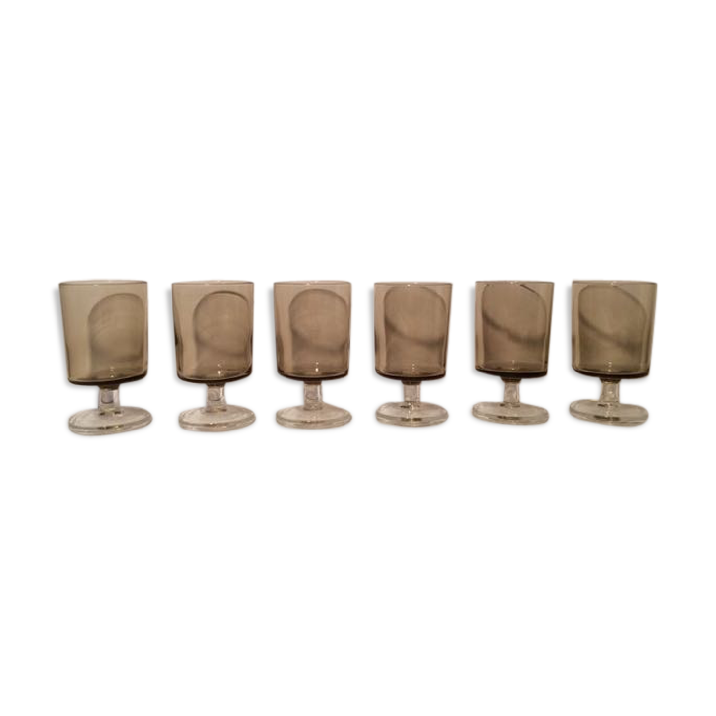 Series of glasses with smoked glass feet