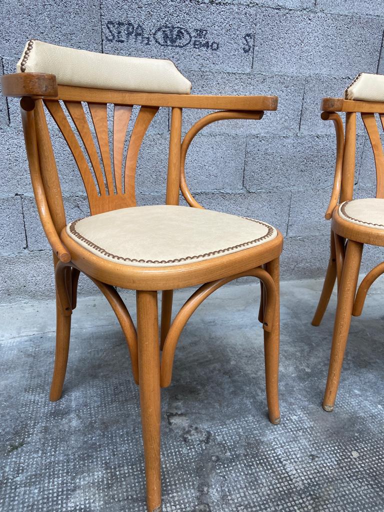 Pair of vintage curved wood restaurant armchairs