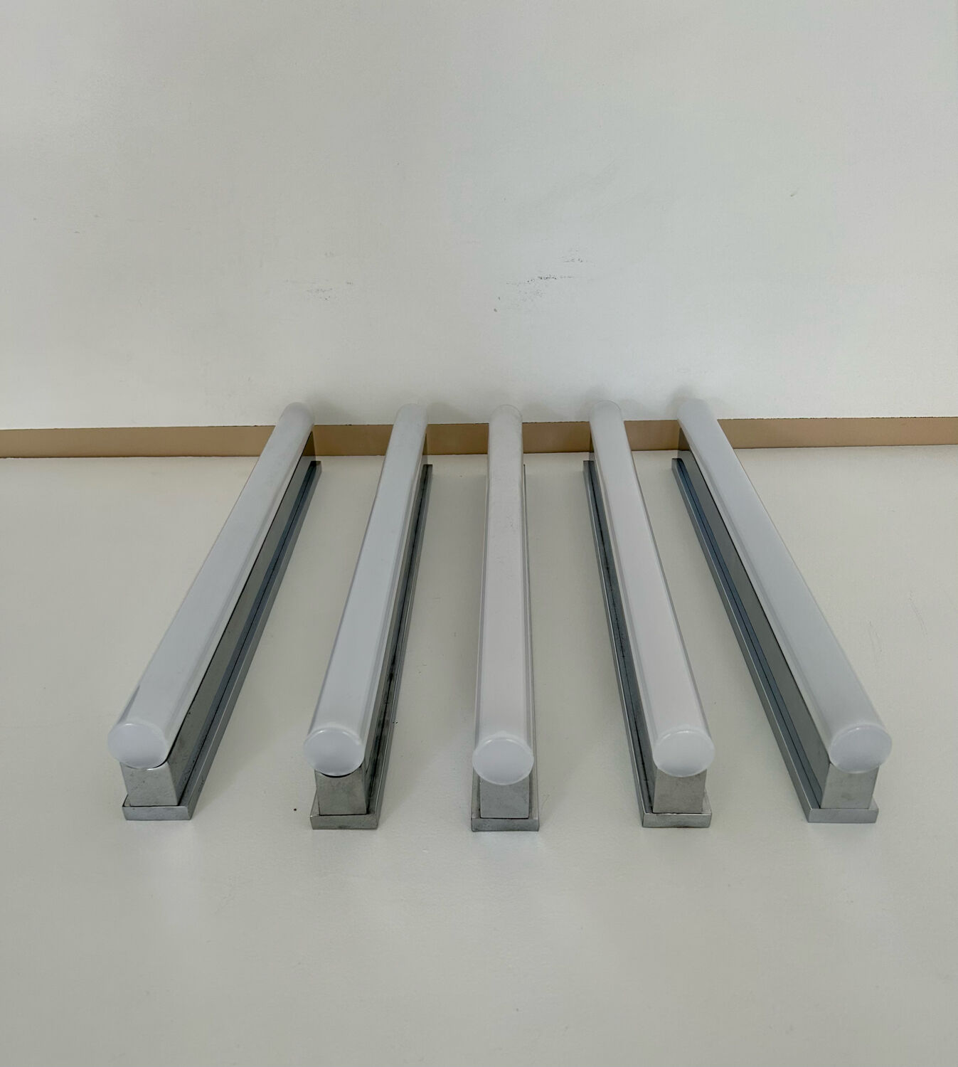 Suite of 5 modernist Perzel, chrome and neon wall lamps, Art deco 1930