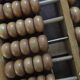 Vintage abacus made of light wood.