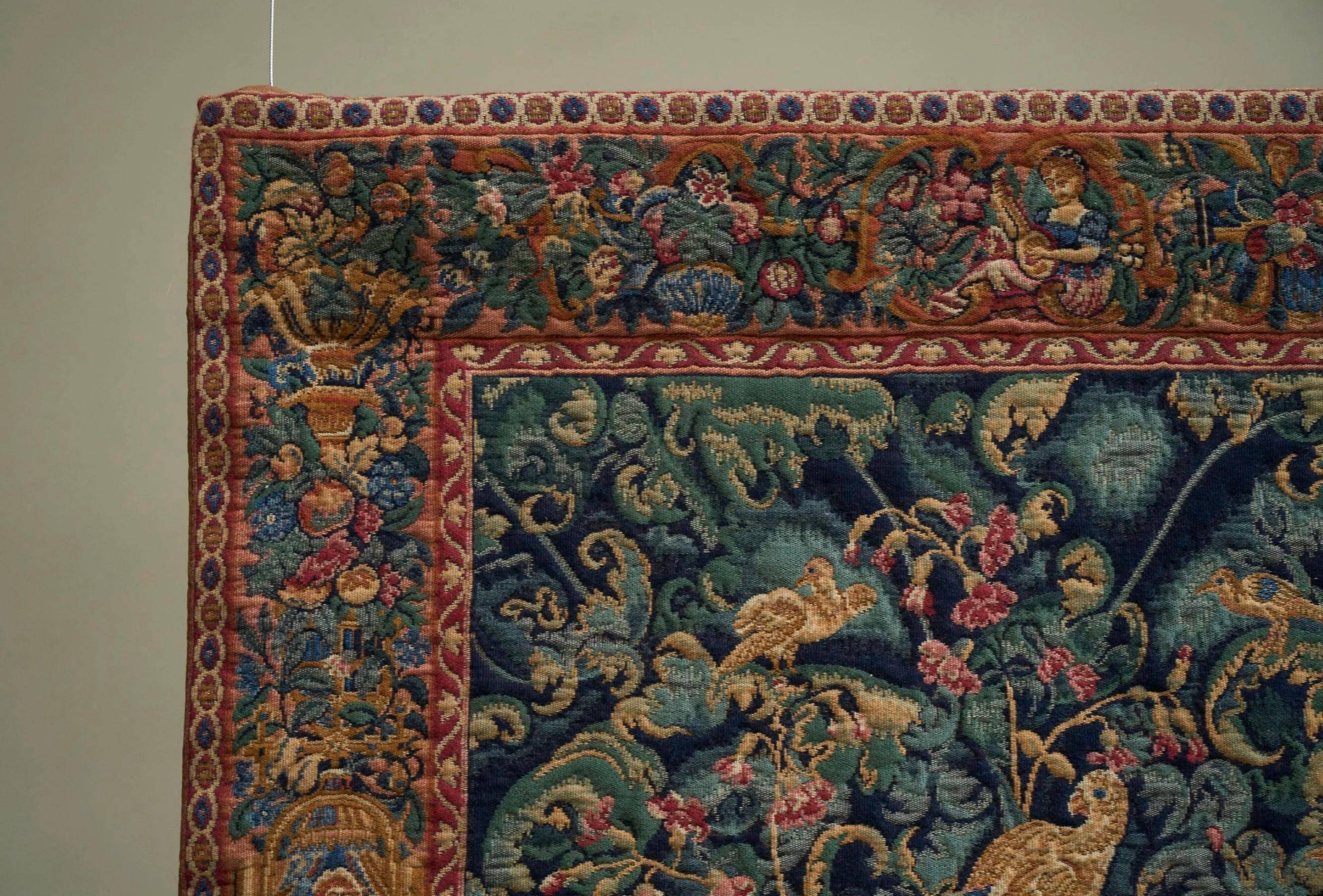 Mid Century wall tapestry with birds, animals, and leaves, Belgium 1960s.