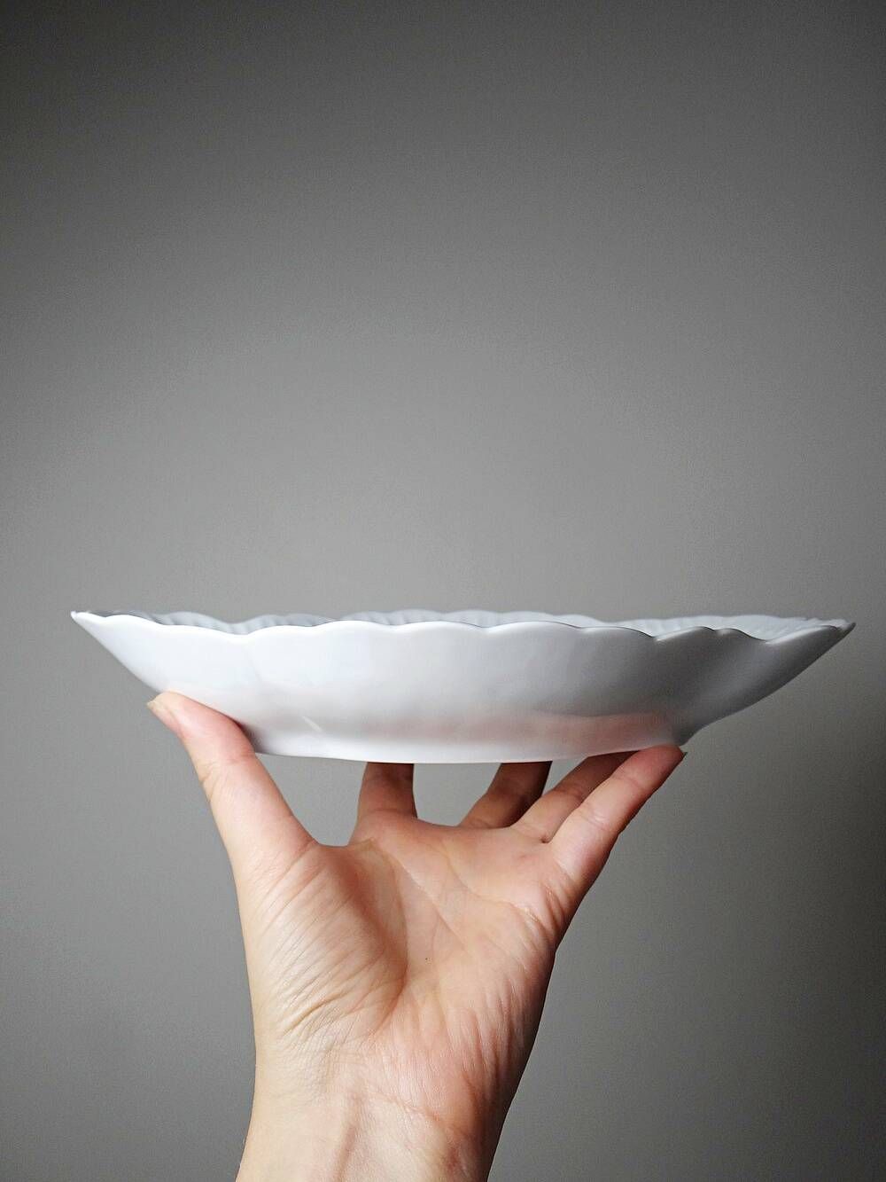 Vintage duo of Chastagner Limoges serving dishes, white rocaille porcelain.