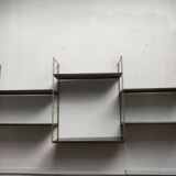 Metal string shelf