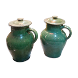 Pairs of jugs in varnished earth