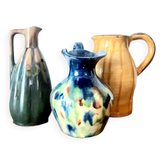 Set of art nouveau ceramic pitchers