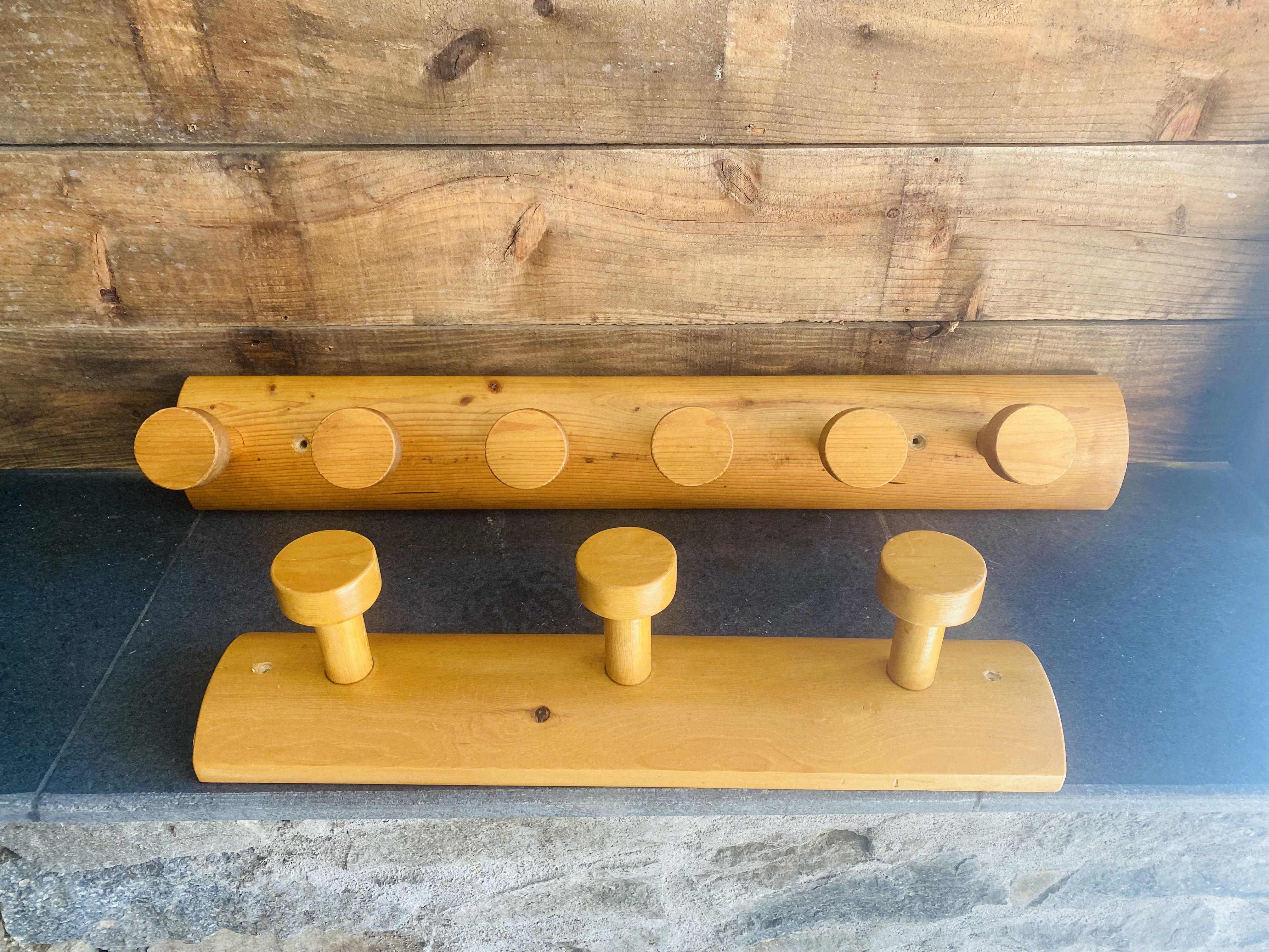 Set of two wooden pateres 60s in the Perriand style.