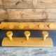 Set of two wooden pateres 60s in the Perriand style.