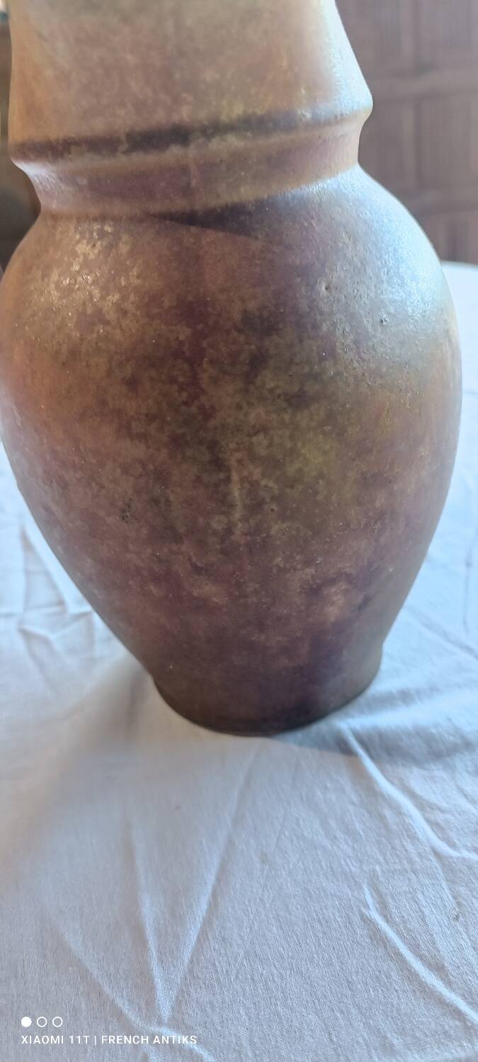 Jug, iridescent glazed stoneware carafe.